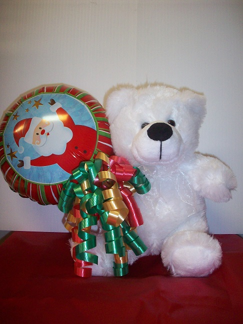 Christmas bear holding balloon